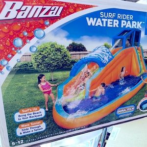 Water slide with climbing wall and pool brand new in box never opened